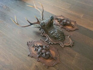 Black forest carved stags heads