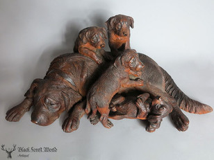 Black forest carved dogs